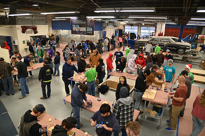 volunteers making toys