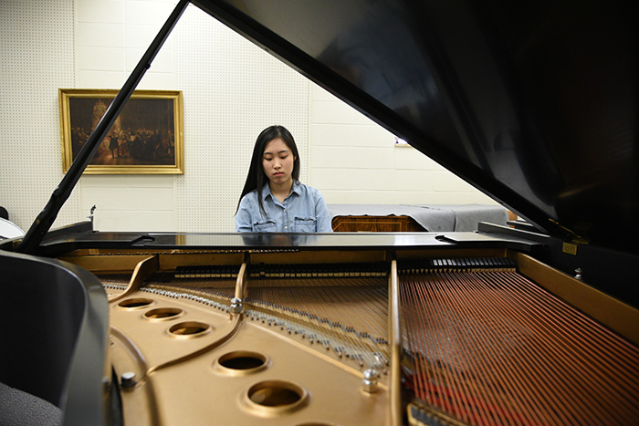 Washburn student playing piano